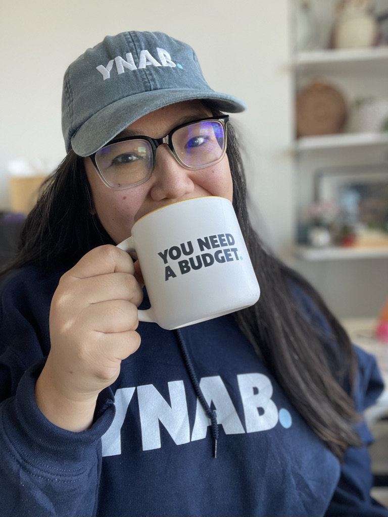 Kerrie wears a lot of YNAB swag to show off her YNAB coach fangirl status